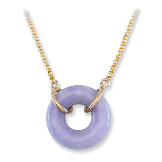 A lavender jade circle pendant necklace on an adjustable 14K yellow gold chain with a small spring ring
clasp.
jade jewelry, jade stone, jadeite jade, jade for women, and jade carving