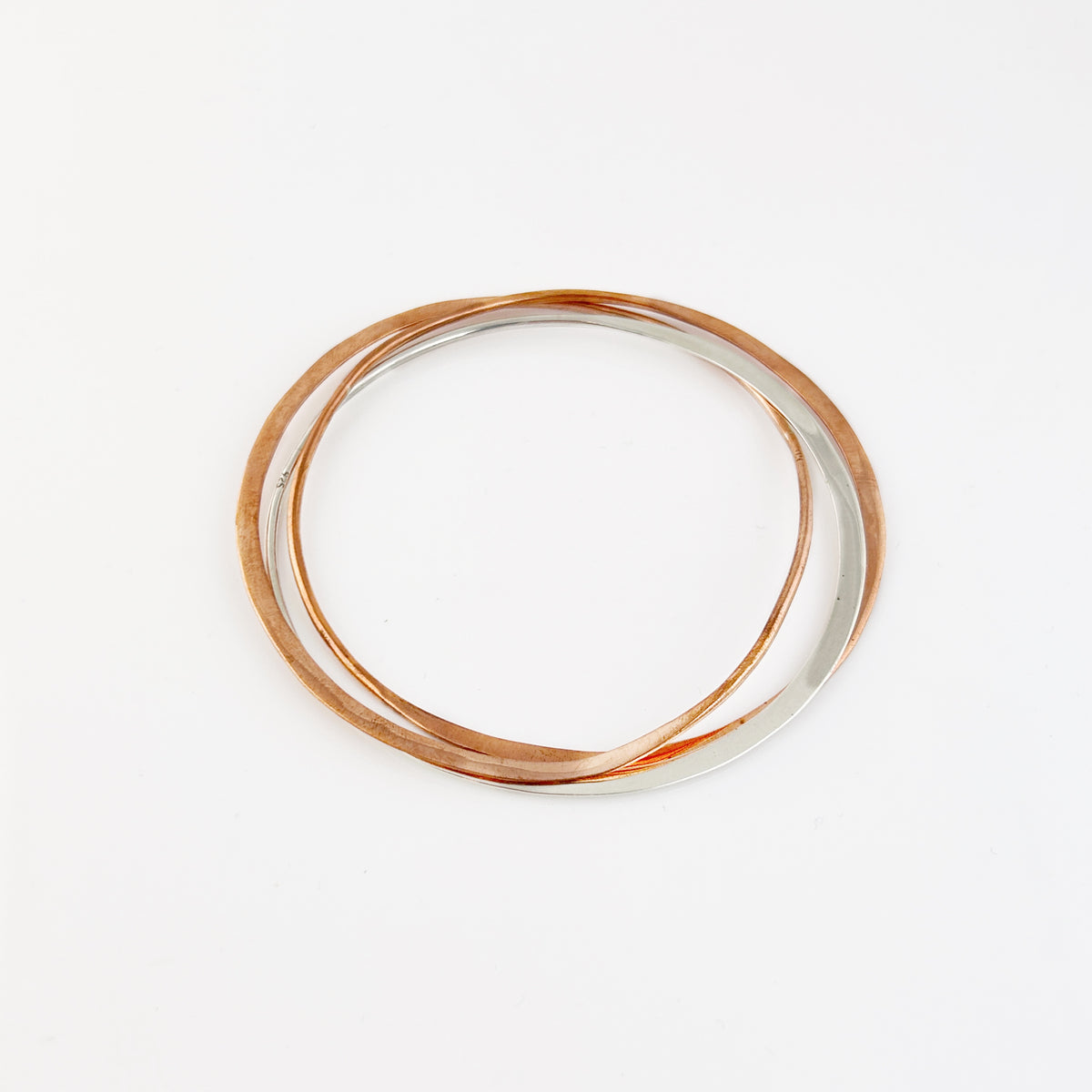 Interlocked Copper + Sterling Bangles
