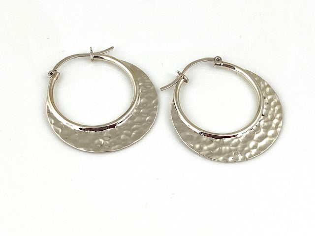 Sterling Silver Hammered hoop earrings by designer Guillermo Arregui. 