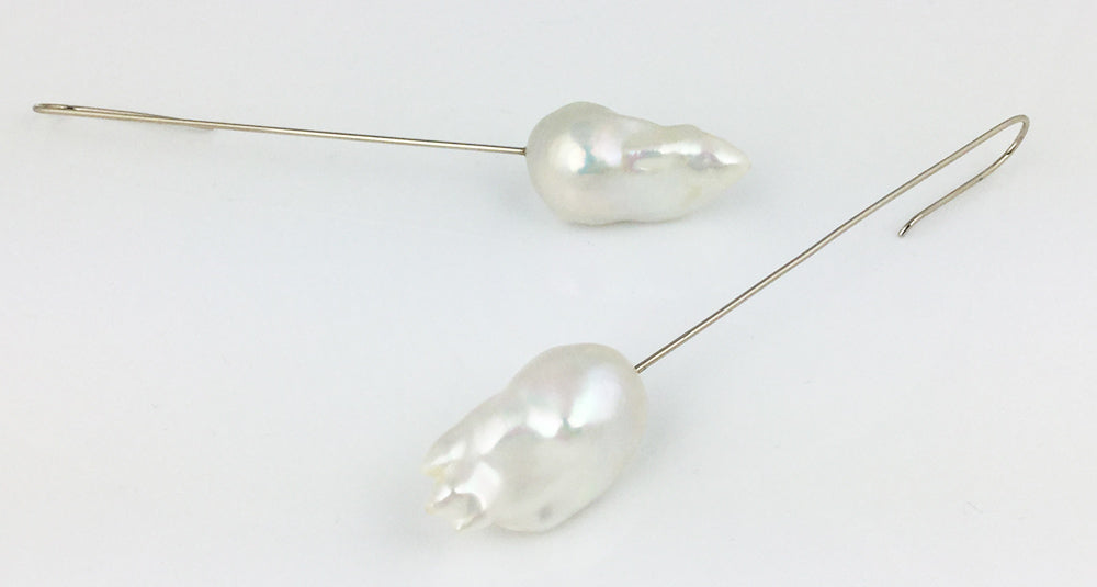 White Fireball pearl earrings on long white gold palladium wires