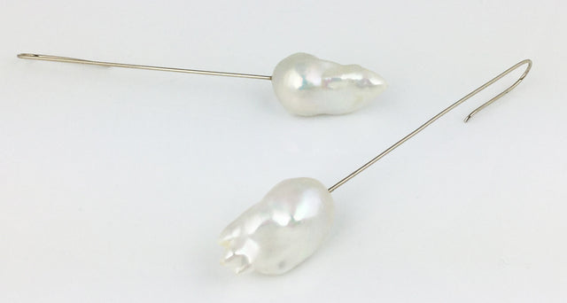 White Fireball pearl earrings on long white gold palladium wires