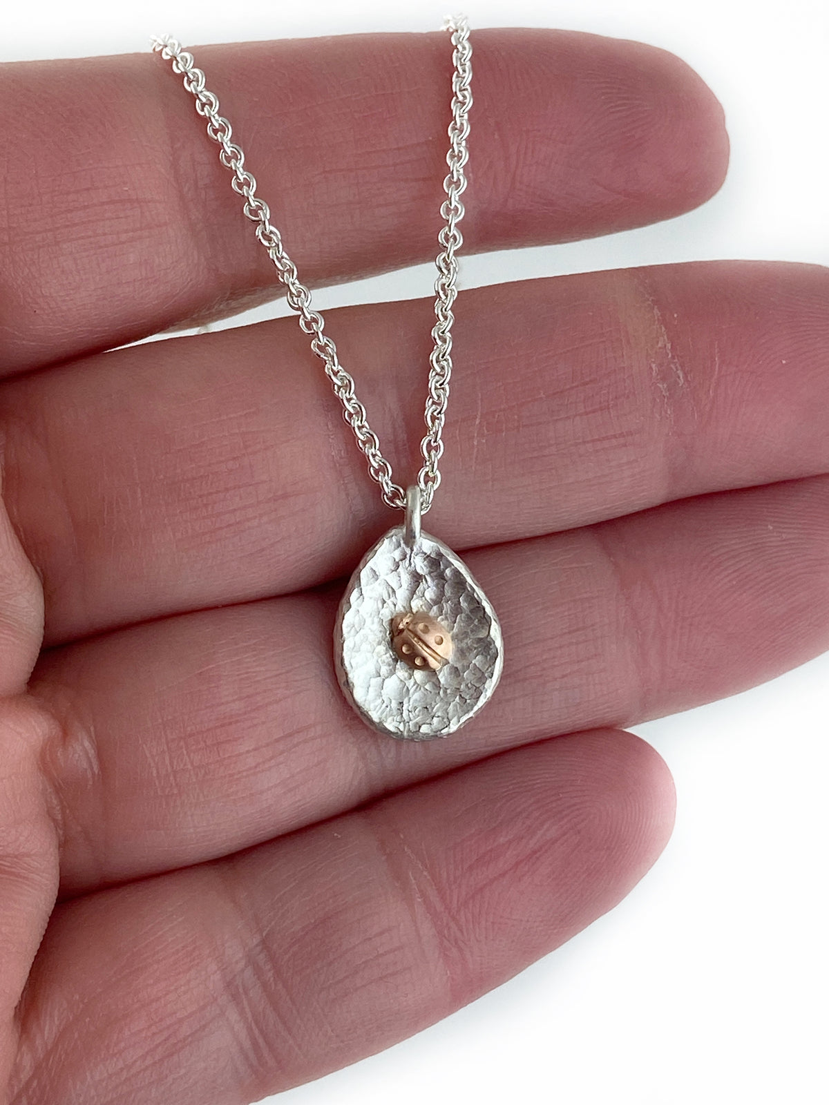 Pebble Necklace with Rose Gold Ladybug