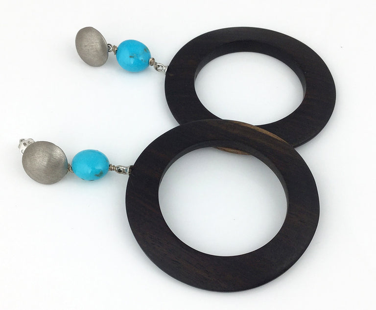 Surprisingly lightweight and easy to wear, this large ebony circle earrings with turquoise and sterling silver are a fun addition to your jewelry collection!  