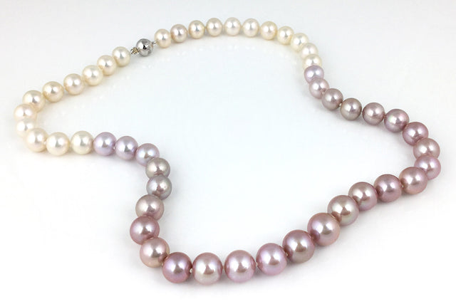 Pink to white ombre strand of very fine freshwater pearls with 18kwg clasp
