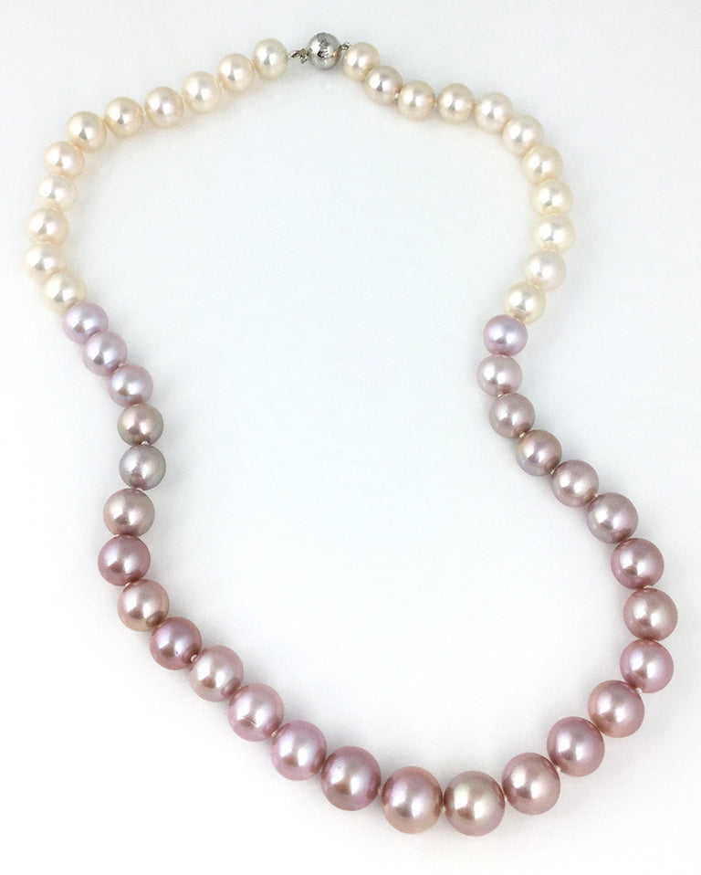 Pink to white ombre strand of very fine freshwater pearls with 18kwg clasp