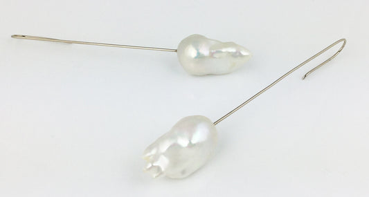 White Fireball pearl earrings on long white gold palladium wires