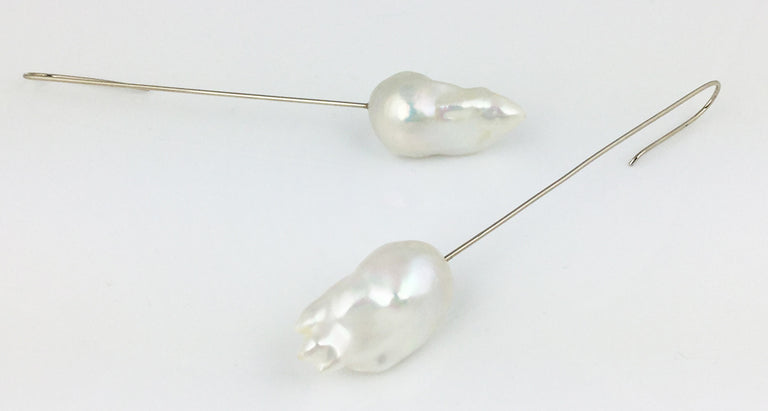 White Fireball pearl earrings on long white gold palladium wires